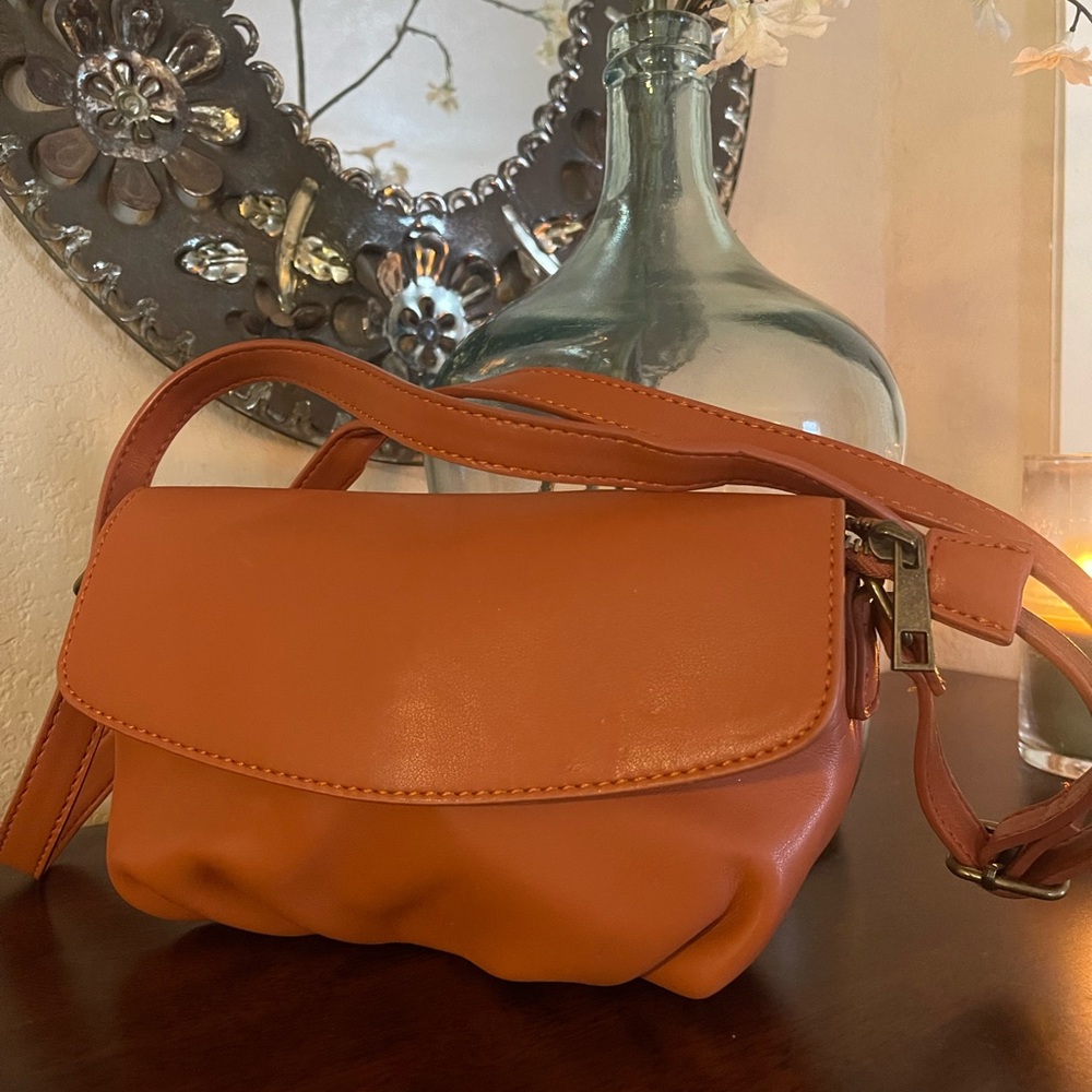 Target soft crossbody bag with adjustable strap.